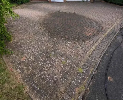 Block paved driveway before cleaning